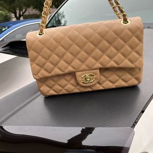 Designer bag black soft leather Chanel style.
